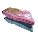 Stack of pink and blue socks with a brand label on a white background