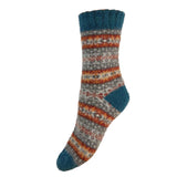 Knitted sock with multicolor pattern on a white background