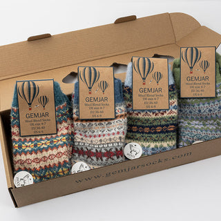 4 pairs of fairisle patterned socks in a gift box